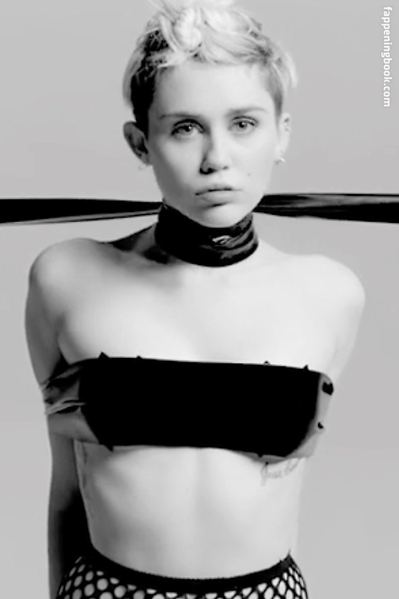 https://fappeningbook.com/photos/m/i/miley-cyrus/2000/1918.jpg